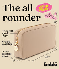 Embla makeup bag sand open compartments demonstrates easy access and organization.