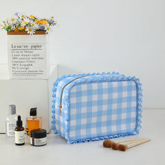 EMBRUNIOICE Gingham Ruffle Makeup Bag side view, compact for easy on-the-go touch-ups.