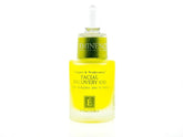 Eminence Biodynamic Facial Recovery Oil bottle pouring shows silky texture that hydrates and enhances glow.
