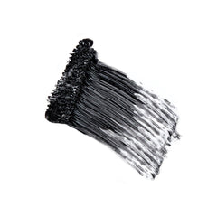 Ere Perez Avocado Waterproof Mascara brush closeup showing conditioning formula for sensitive eyes.