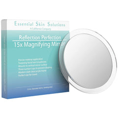 Essential Skin Solutions 15X magnifying mirror close-up for precise tweezing and makeup application.