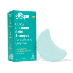Ethique curl-defining shampoo bar with shea butter packaging showcases eco-friendly design for sustainable haircare.
