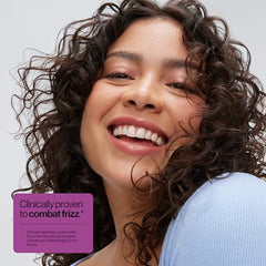 Eva NYC Frizz Fixer smoothing shampoo pump provides even distribution for detangling.