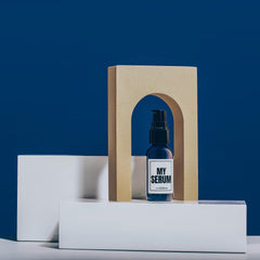 Evan Alexander Fine Grooming MY Serum Beard Oil being poured for hydration.