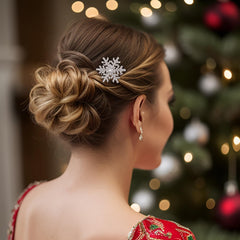 EVER FAITH snowflake hair side comb worn with an elegant chignon showcases silver-tone shimmer.