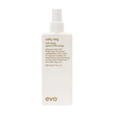 EVO Salty Dog salt spray bottle demonstrates textured beach-inspired hair with a matte finish.