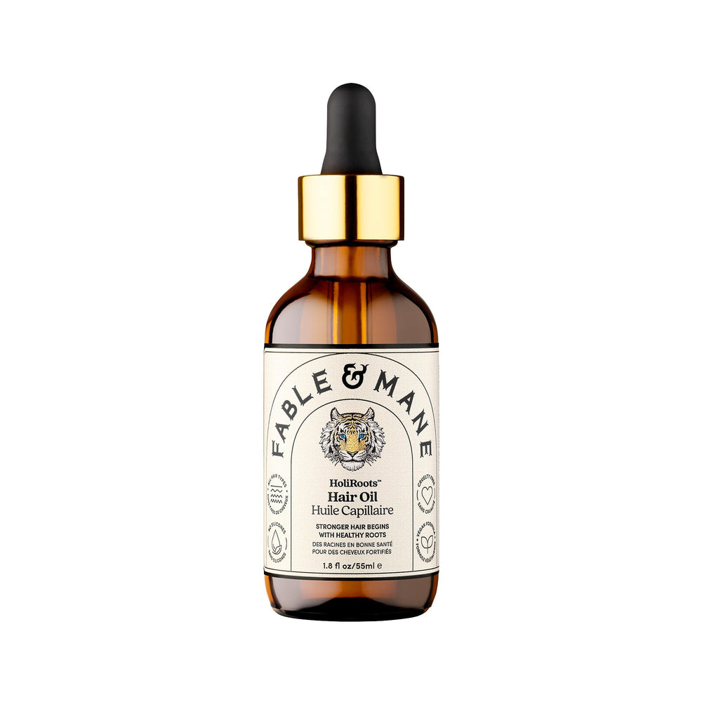 Fable & Mane HoliRoots oil bottle promoting nourishing scalp for healthier hair.