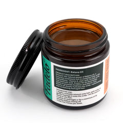Fadelo Batana Oil jar labeled 4.06 oz with natural ingredients.