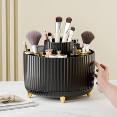 Fanado makeup brush holder with gold-plated feet protects surfaces while adding elegance.