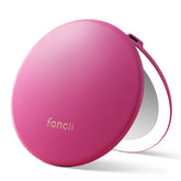 Fancii Taylor compact travel mirror 1x view for full-face makeup application.
