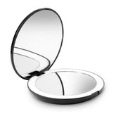 Fancii travel mirror open view shows a large 5-inch distortion-free surface for precise makeup checks