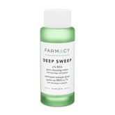 Farmacy 2% Salicylic Acid Toner bottle on a bathroom shelf for clear pores.
