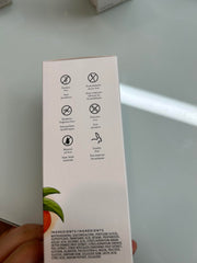 Farmacy 3% TXA Toner glass bottle in bathroom suggesting clearer, radiant skin