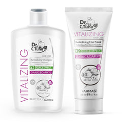 FARMASI Dr. C. Tuna garlic shampoo bottle shows nourishing formula for smoother, healthier-looking hair.