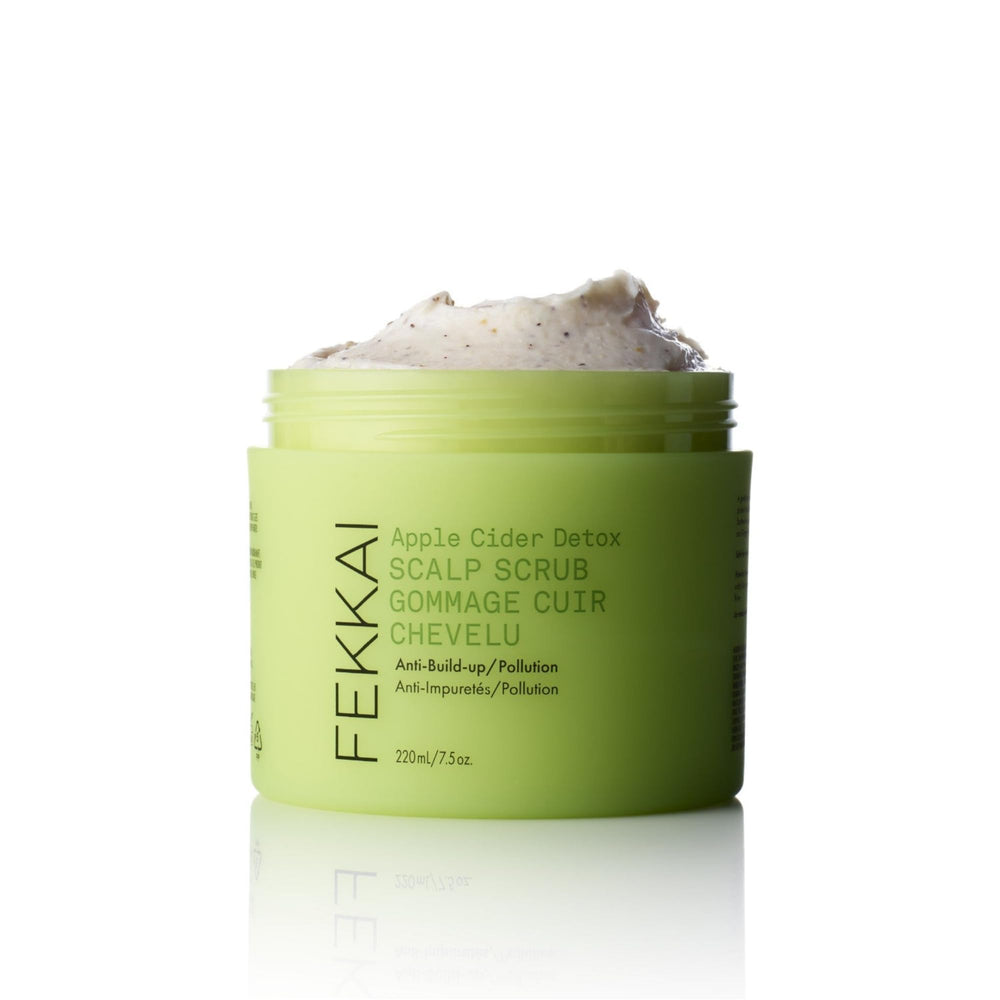Fekkai Apple Cider Detox Scrub bottle highlights scalp cleansing benefits.