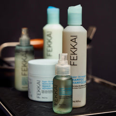FEKKAI PowerBond Mist spray in action provides heat protection.
