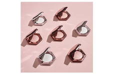 Fenty Diamond Bomb applies as a 3D glitter veil for sparkling skin.
