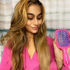 FHI Heat UNbrush lightweight handle supports comfortable styling sessions.