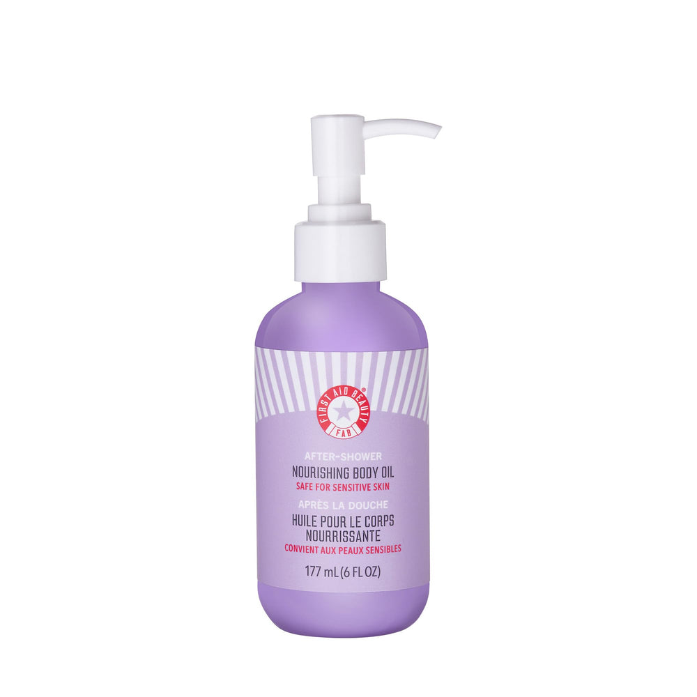 First Aid Beauty After-Shower Nourishing Body Oil bottle pouring for quick absorption and smooth skin