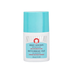 First Aid Beauty Bronze Glow Drops bottle pour shows easy application