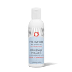 First Aid Beauty hydrating toner bottle pour shows gentle, alcohol-free hydration for sensitive skin