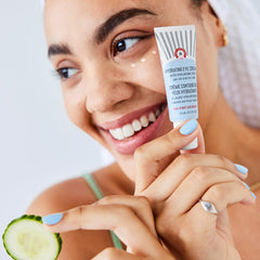 First Aid Beauty Hydrating Eye Cream close-up texture highlights rich, creamy feel ideal for day and night care.
