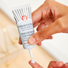 First Aid Beauty Hyaluronic Acid ingredient close-up shows plumping hydration that supports smooth under-eye skin.
