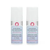 First Aid Beauty Ultra Repair moisturizer pack front shows two bottles for daily hydration.