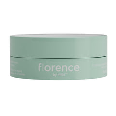 Florence by Mills close-up of eye gel patches shows soothing green tea and caffeine ingredients.