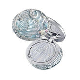 Flower Knows Shell's Jewel baked powder compact with mirror enables quick on-the-go touch-ups.