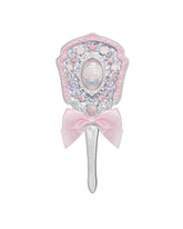 Flower Knows Shell's Jewel Hand Mirror close-up highlights pink seashell motif and ornate silver filigree, ideal for touch-ups.