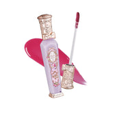 Flower Knows lip gloss bottle on luxe packaging, ideal for gifting