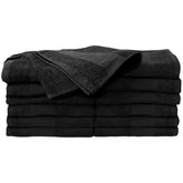 ForPro Premium Bleach Tough Towels Black folded reveal durable hems designed for high-traffic salons.