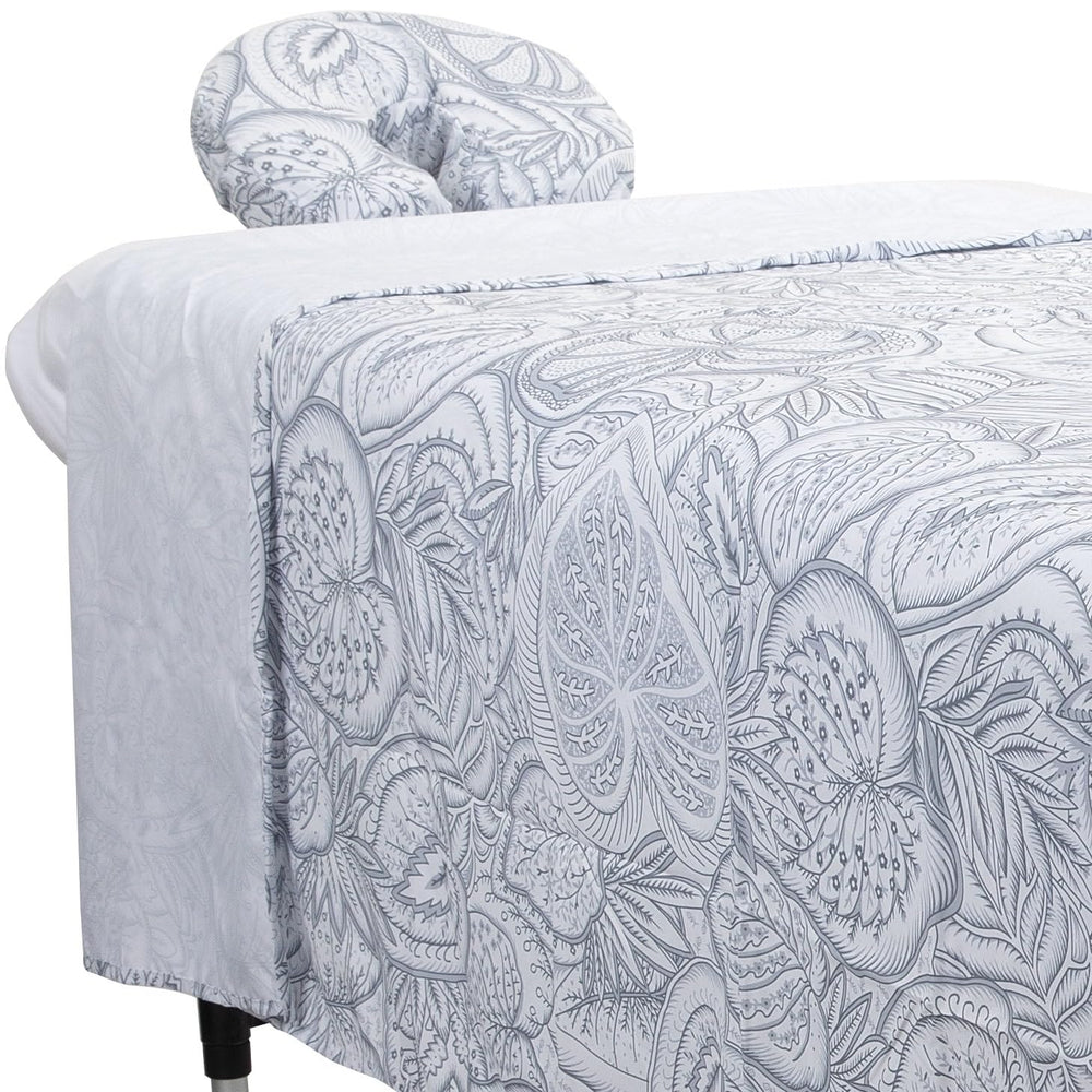 ForPro Premium Designer Microfiber 3-Piece Massage Sheet Set on a table delivers silky, professional comfort.