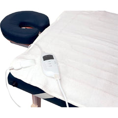 ForPro extra-large fleece warmer on a massage table provides consistent comfort.