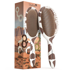 FRAMAR cow-print detangler brush front view for smooth detangling