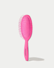 FRAMAR Detangling Brush bristles closeup reveals flexible bristles for gentle detangling.
