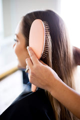 Framar detangling brush with painless bristles smooths knots without pulling