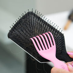 FRAMAR cleaner tool with fine wire bristles removes buildup around brush bases.