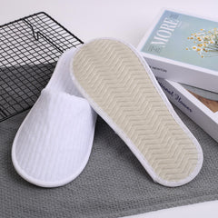 Frcctre coral fleece upper slippers emphasize soft comfort for home spa and hotel use.