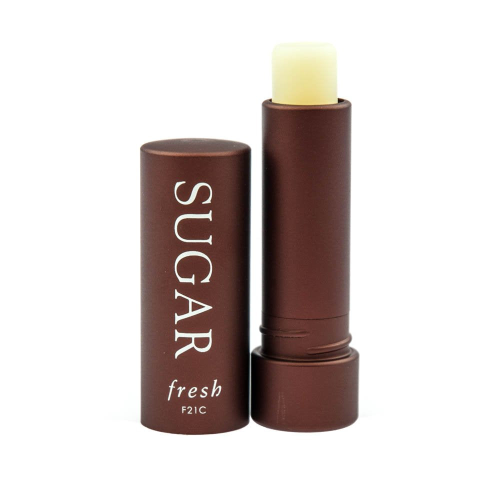 Fresh Sugar Lip Treatment SPF 15 original clear tube close-up for hydrating lip care.