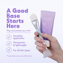 FRUDIA Blueberry Hydrating Air Fit Sunscreen tube closeup highlights lightweight texture.