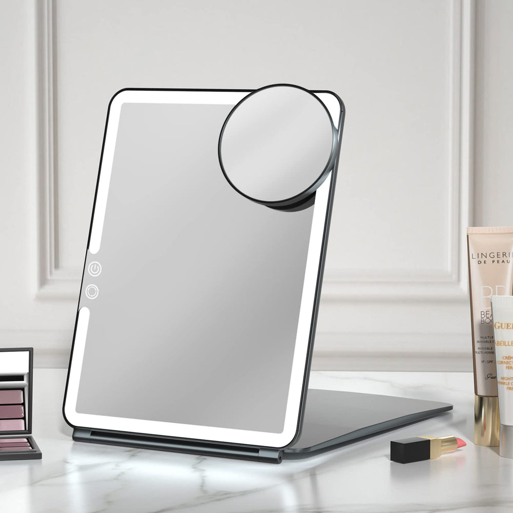 FUNTOUCH travel mirror with 10x7.5-inch lighted surface for full-face makeup