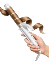 FURIDEN Lite dual-voltage curling iron 1-inch barrel close-up for smooth, salon-grade curls.