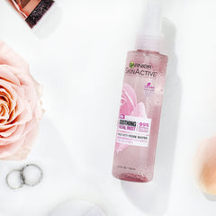 Garnier SkinActive mist applied to the face for a cooling, refreshing feel.
