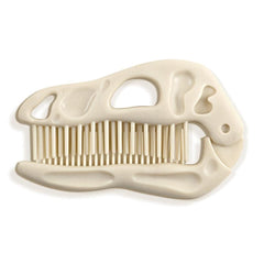 Genuine Fred Bonehead teeth close-up shows flexible bristles gentle on scalp while removing knots.