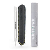 GERMANIKURE clear glass cuticle stick with leather sleeve for precise cuticle work and protection.