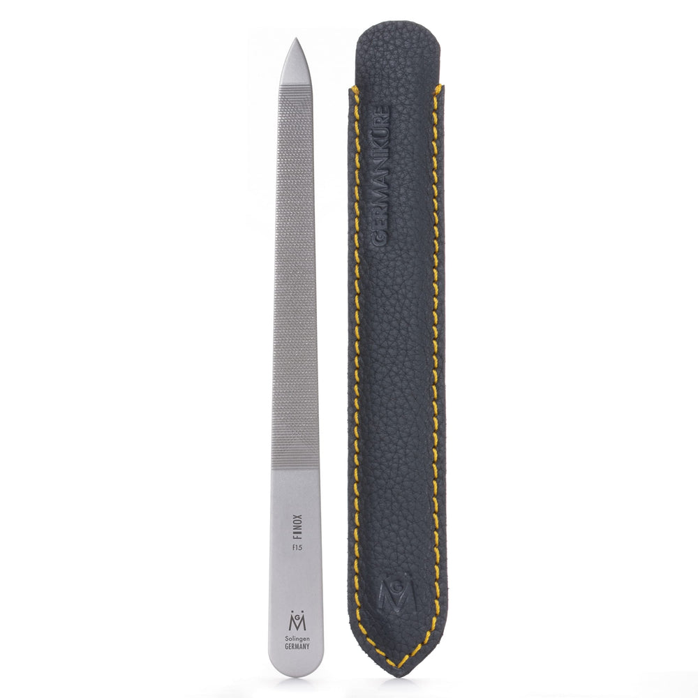 GERMANIKURE triple-cut file with engraved handle for precise, long-lasting nail shaping.