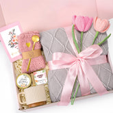 GiftHarbor birthday gift box with cozy blanket and mug for warm celebrations.