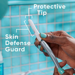 Gillette Venus dermaplaning blade close-up with Skin Defense Guard protecting skin